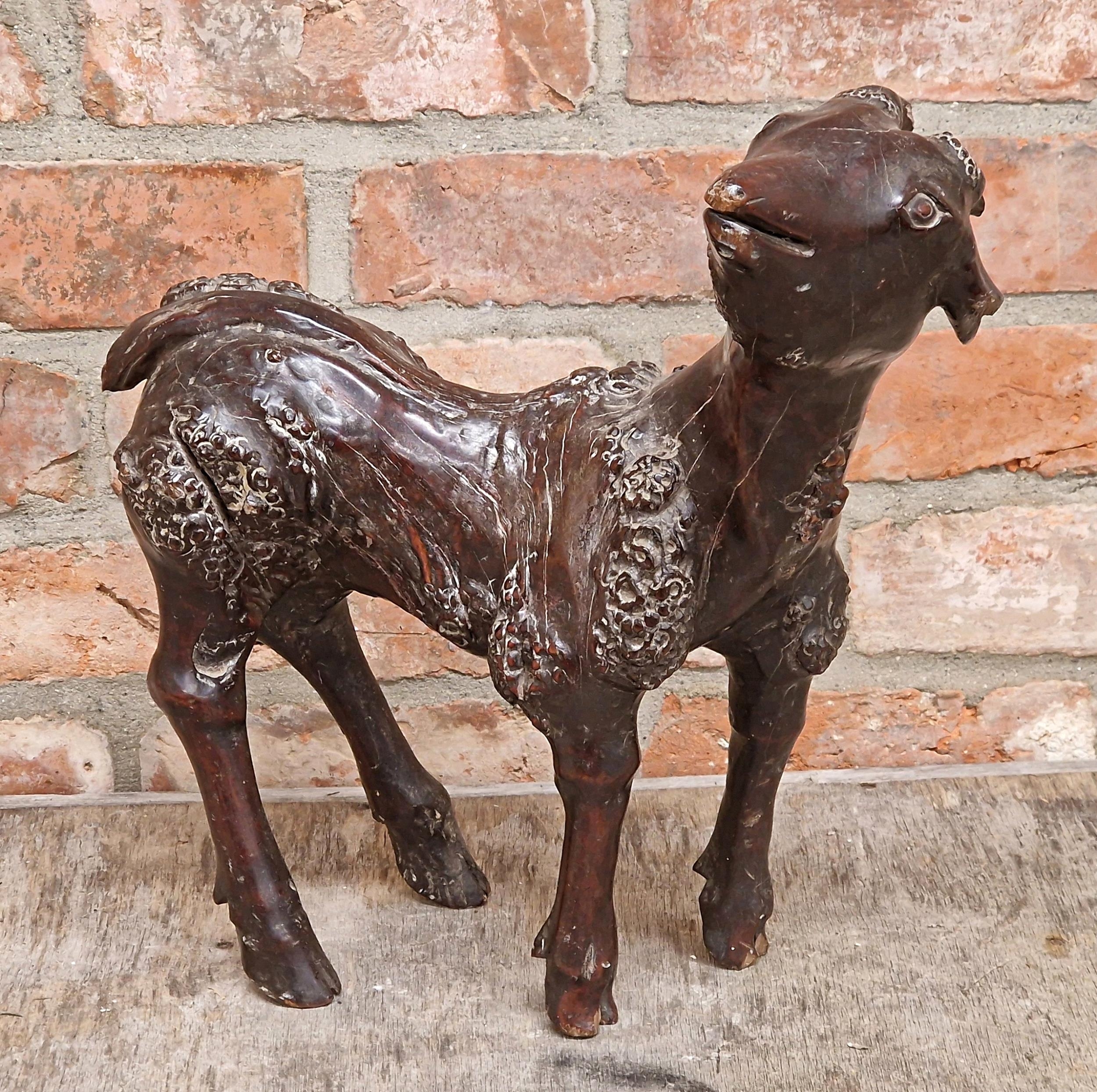 Impressive Chinese late Qing dynasty root wood carving of goat, H 40cm x L 40cm (AF)