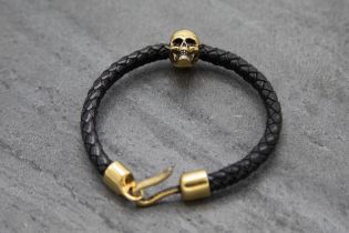 Alexander Mcqueen skull charm plaited leather bracelet