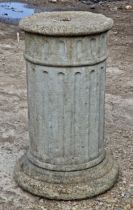 A reconstituted stone pedestal with fluted detail, H 51cm