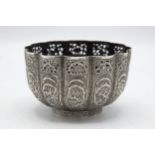 Indian white metal (untested) lobed pedestal bowl embossed with scroll foliage, 11cm diameter, 6oz