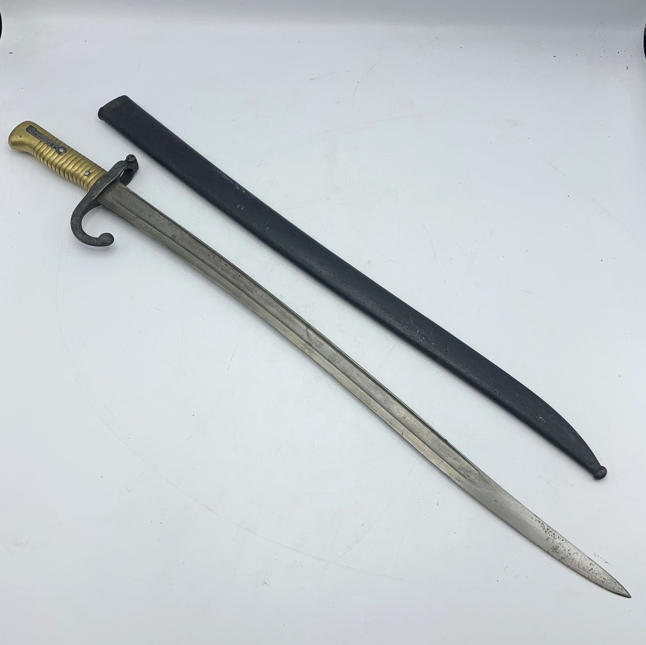 A 19th Century French 1866 pattern Chassepot bayonet with fullered Yataghan style blade, ribbed - Image 2 of 3