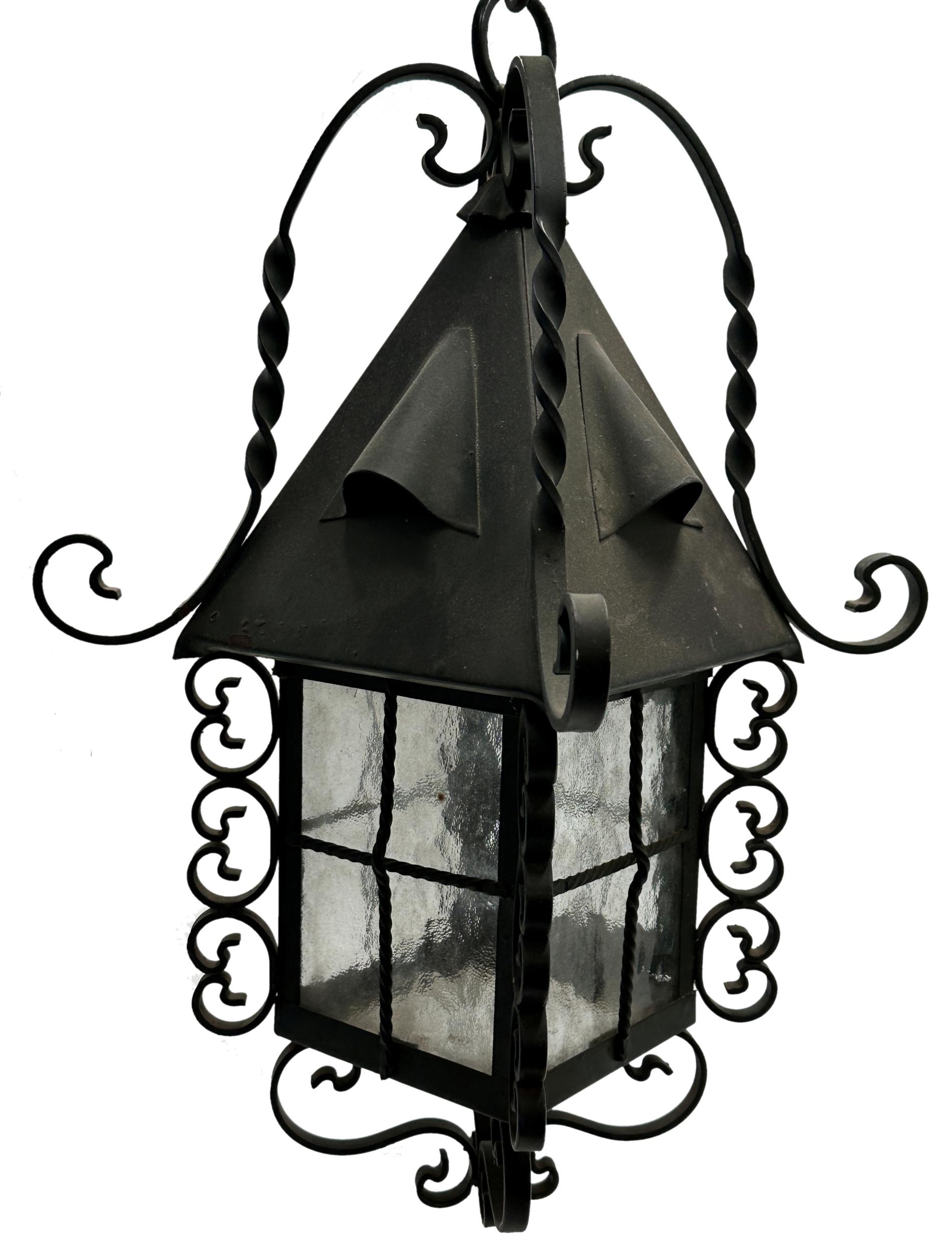 Large Arts & Crafts Twisted Metal & Glass Panel Hanging Lantern. H 50cm.