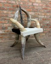 Stylish designer cow horn and hide chair, 100cm high