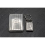 Good quality early 20th century engines turned silver cigarette case and vesta on a chatelaine,