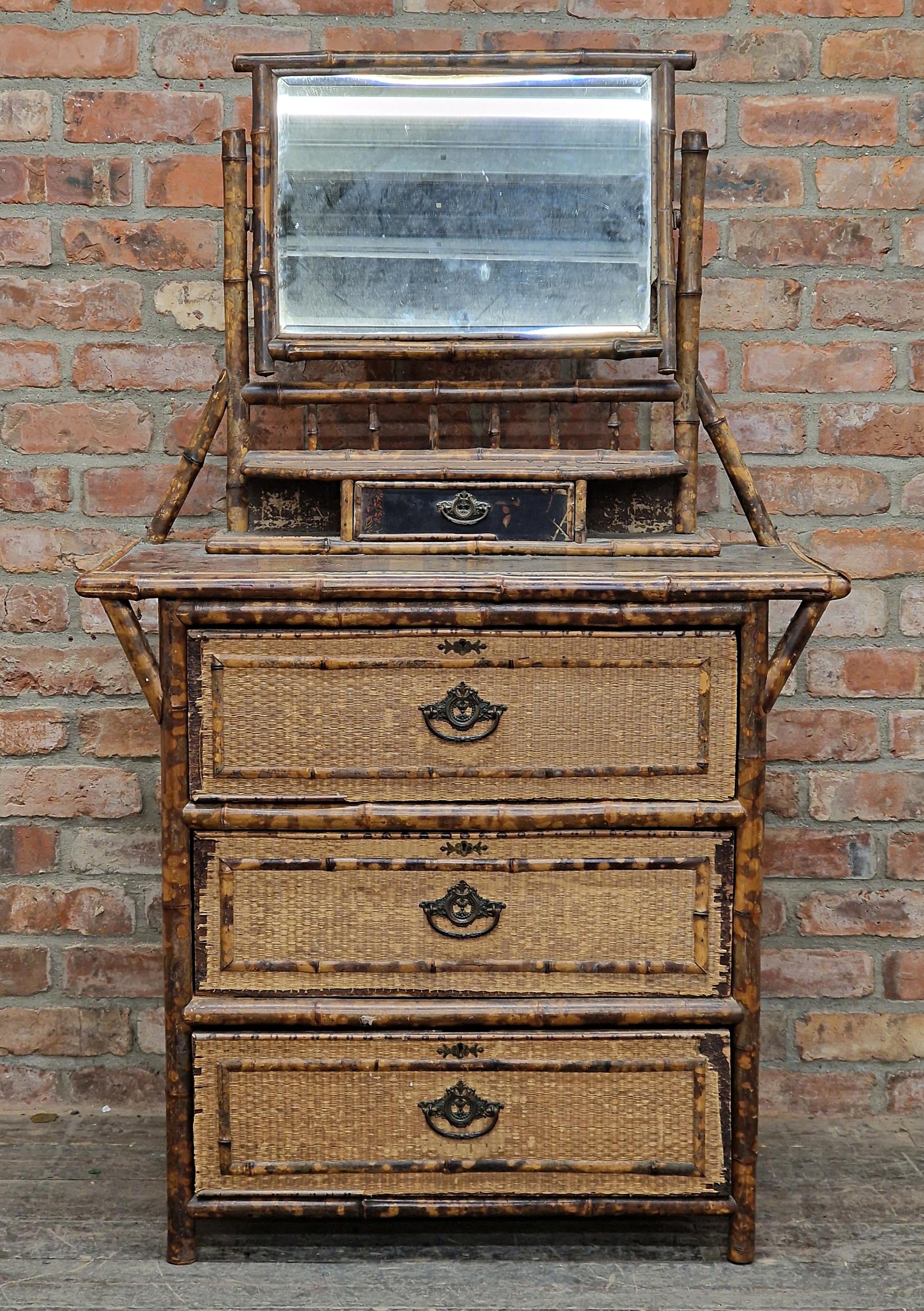 Victorian Aesthetic Movement bamboo and rattan dressing chest with mirror back raised over one short