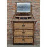 Victorian Aesthetic Movement bamboo and rattan dressing chest with mirror back raised over one short