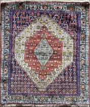 North West Persian Senneh rug, geometric medallion, multicoloured panels, 160 x 125cm