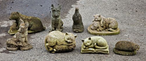 Eight reconstituted stone garden ornaments of various different animals to include cat, dog, badger,