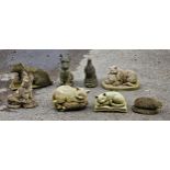 Eight reconstituted stone garden ornaments of various different animals to include cat, dog, badger,