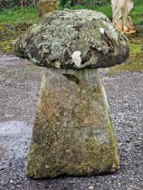 A well weathered natural stone staddlestone, H 70cm x 50cm diameter