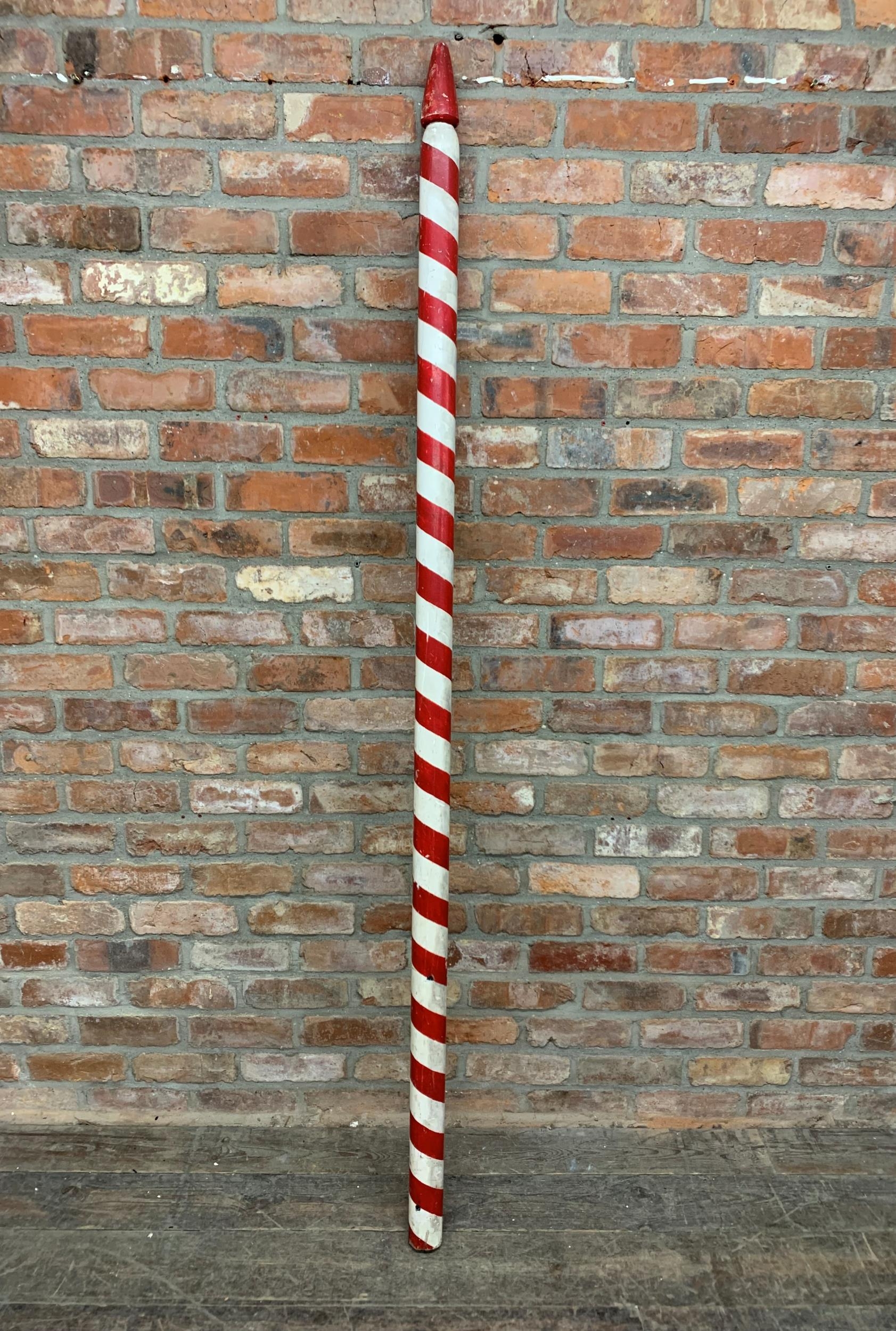 Large hand painted red and white striped wooden barbers pole, H 215cm