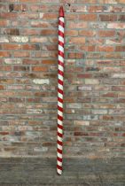 Large hand painted red and white striped wooden barbers pole, H 215cm