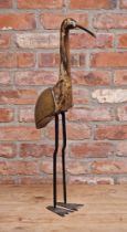 A vintage wooden and brass crane with iron legs, H 81cm