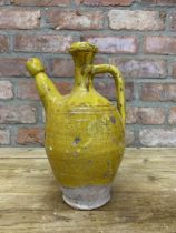 Antique 18th century primitive French clay pitcher with mustard yellow glaze, H 29cm