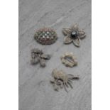 Five white metal and marcasite brooches (5)