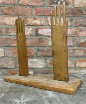 Pair of Wooden glove makers glove moulds on stand, W 38cm x H 35cm