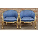 Pair of good quality 19th century French gilt wood tub chairs with blue floral fabric upholstery,