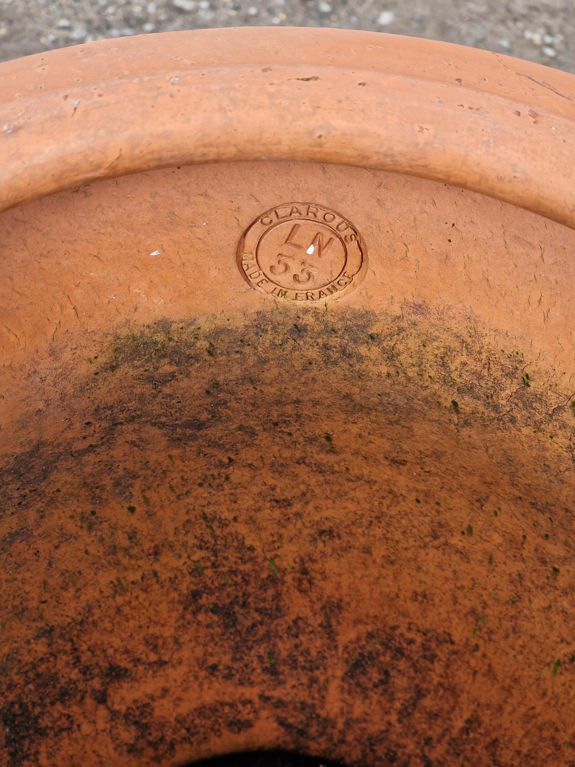 French terracotta urn with lions mask detail raised on a fluted terracotta pedestal, H 82cm x DIA - Image 2 of 2