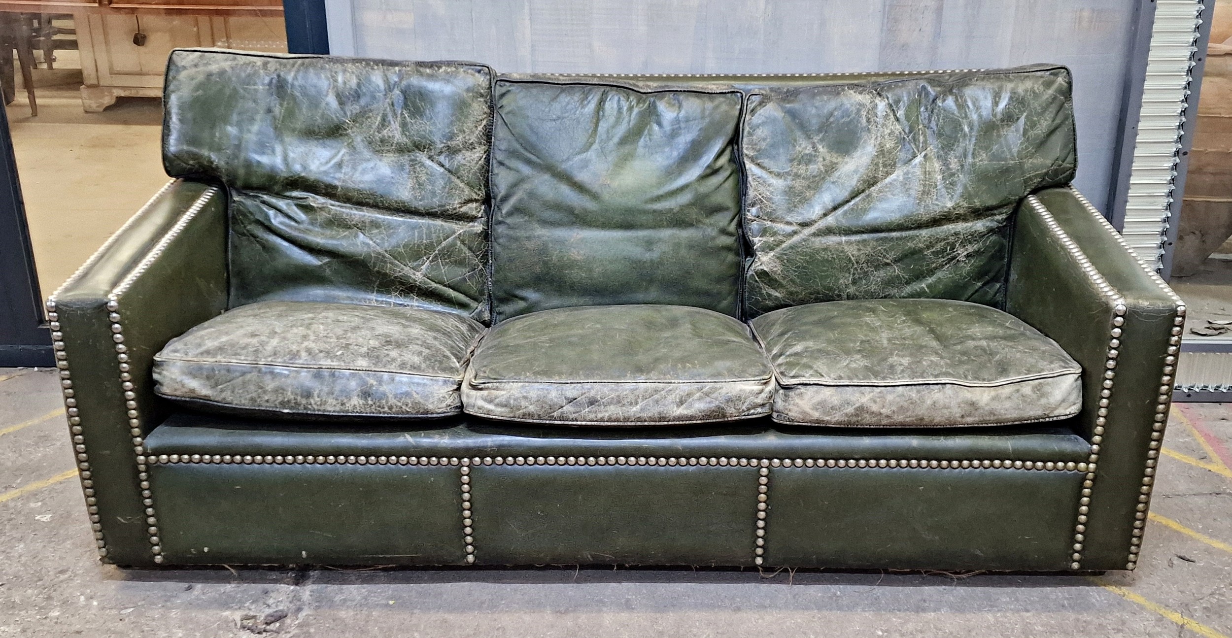 Good quality antique studded green leather three seater sofa, H 81cm x W 201cm
