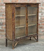 Victorian Aesthetic Movement bamboo and rattan glazed display cabinet with twin glazed panel doors