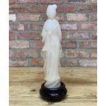 Mid century Chinese hand carved nephrite figurine depicting 'Chinese Beauty' held atop carved wood