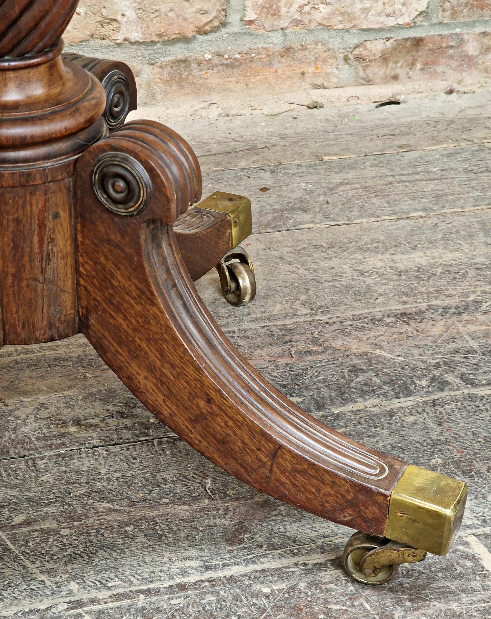 Regency mahogany fold over top card table, raised on a quadruped base with sabre supports on brass - Image 4 of 4