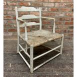 Good early Scandinavian primitive low nursing chair with painted ladder back and cord strung seat