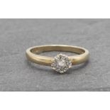 9ct diamond cluster ring with central 0.10ct stone, size O/P, 2.4g