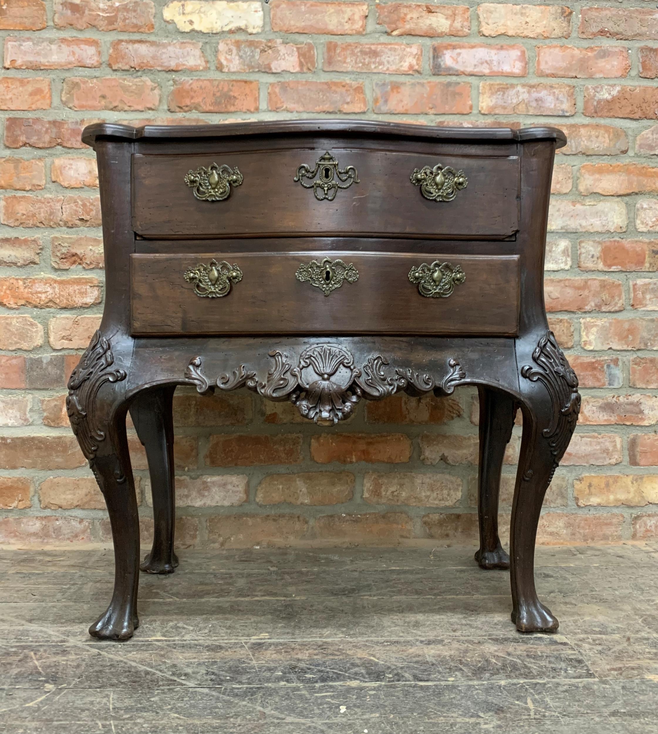 Good antique Spanish oak serpentine chest of drawers, with carved apron and cabriole legs, 83 x 83cm