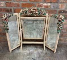 Early 20th century triptych dressing mirror with applied leather foliage, 73cm high