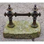 Victorian cast iron boot scraper mounted on a granite base, H 31cm x W 33cm