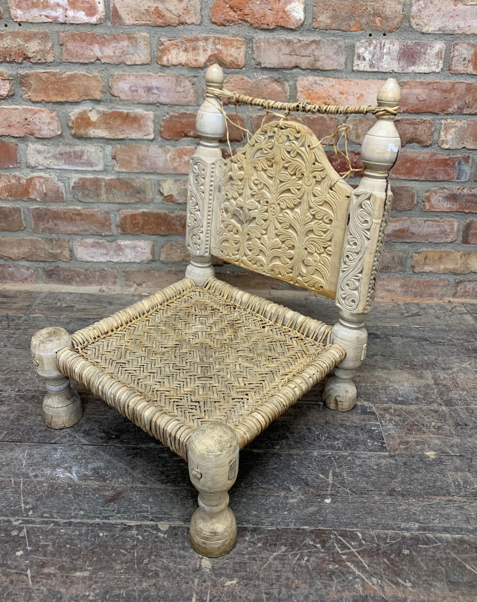 19th century Indian carved wood Pidha 'Marriage' chair, having carved back rest carved with