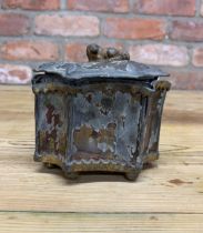 Tudor period hand painted faceted pagoda shaped lead tobacco box with spaniel dog finial top, signs