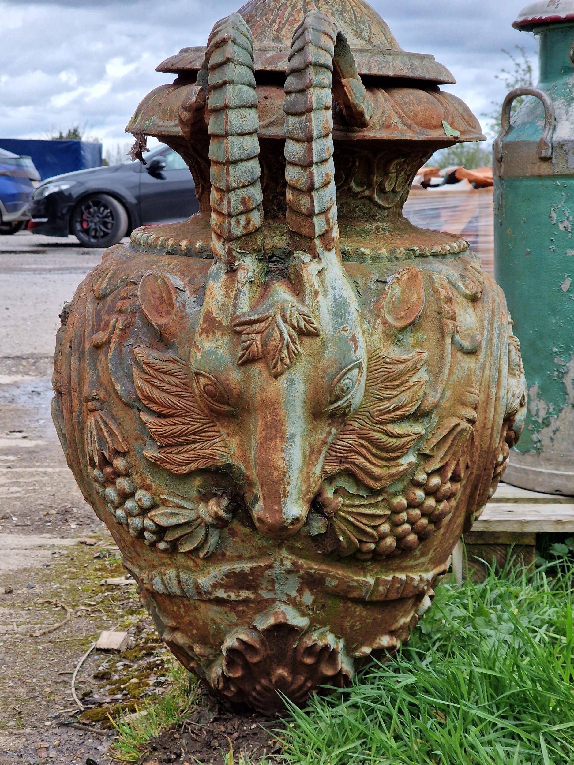 A good quality ornate cast iron garden urn with rams head handles, pineapple finial and foliate - Image 3 of 3