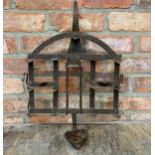 Antique blacksmiths wrought iron wall sconce candle holder, H 55cm x W 40cm