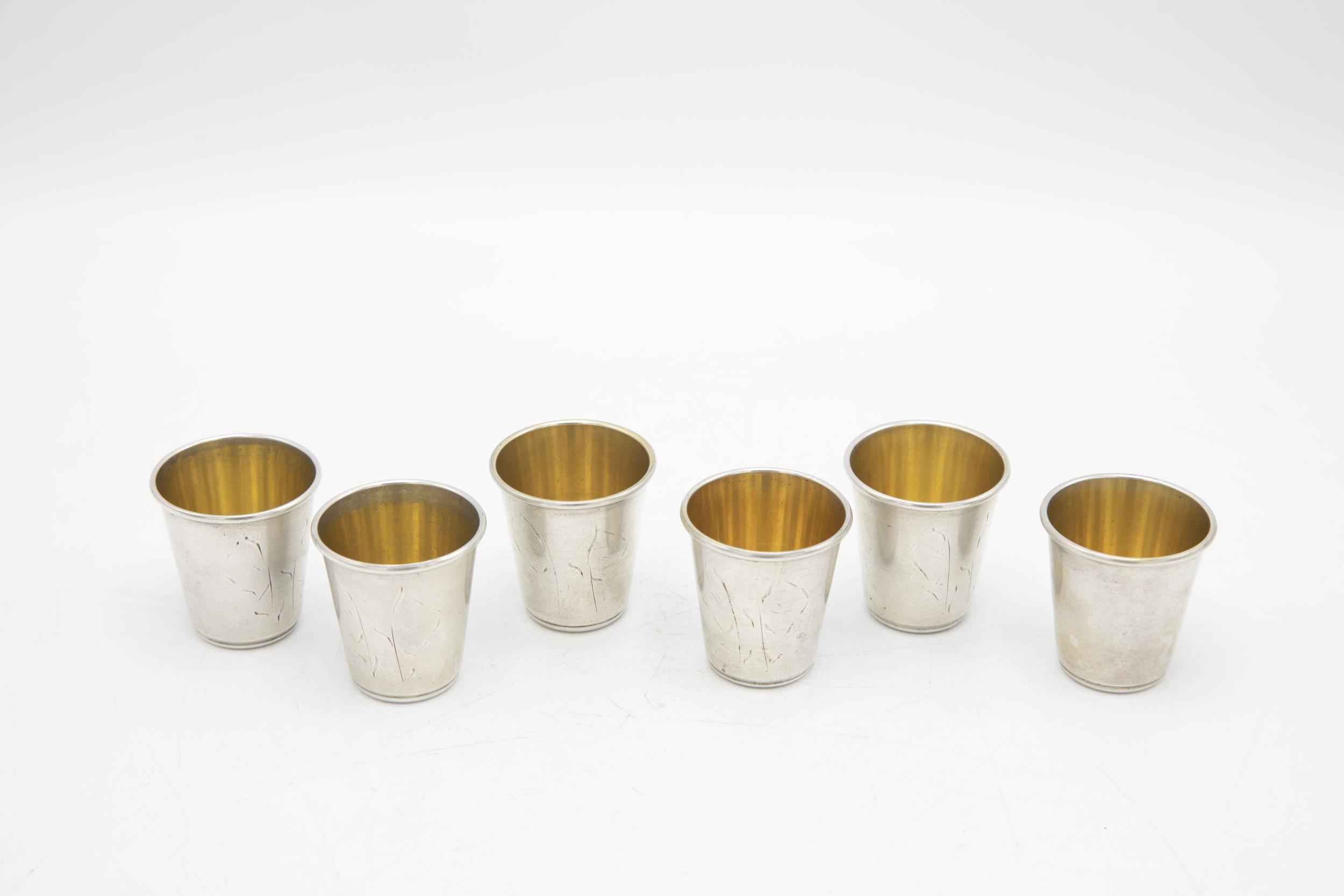 Set of six Russian silver Vodka tots with engraved decoration and gilt interiors, 4cm high, 3.5oz - Image 3 of 3