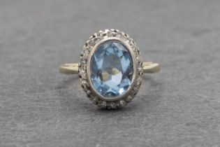 9ct aquamarine and diamond halo ring, 1.5ct aquamarine, size L, 4.2g