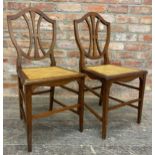 Pair of Liberty of London Arts and Crafts oak bergere side chairs (2)