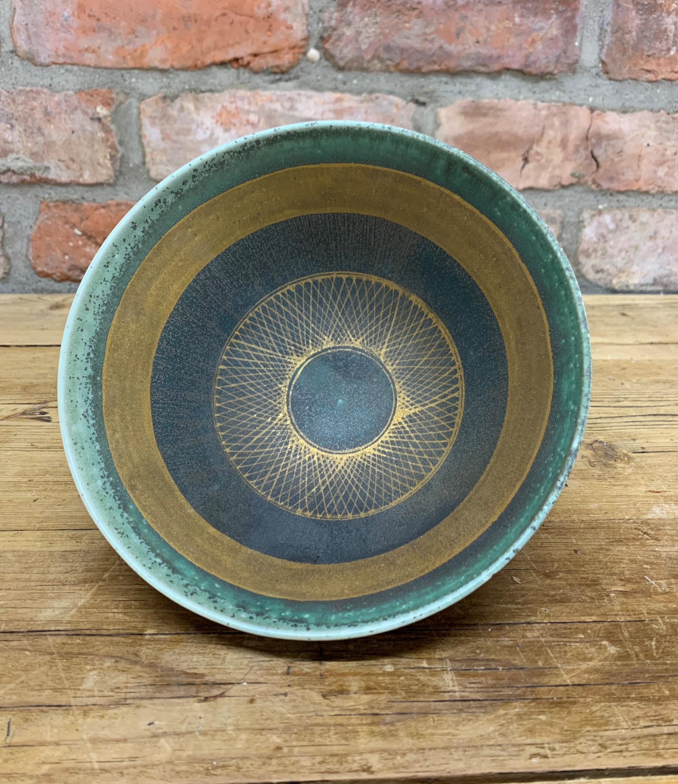 Mary Rich circular tapered studio pottery bowl with banded and gold crosshatch design, stamped to