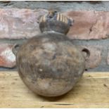 Archaic Incan double handed terracotta pot with rounded bottom and finial finish to rim, H 16cm