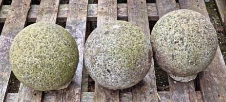 Three weathered reconstituted stone ball pier caps, H 20cm (3)