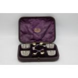 Good quality Victorian cased set of four silver salts and spoons, maker Walter & John Barnard,