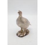 Good silver gilt standing grouse upon a mound, maker Camelot Silverware, Sheffield 2014, 17cm