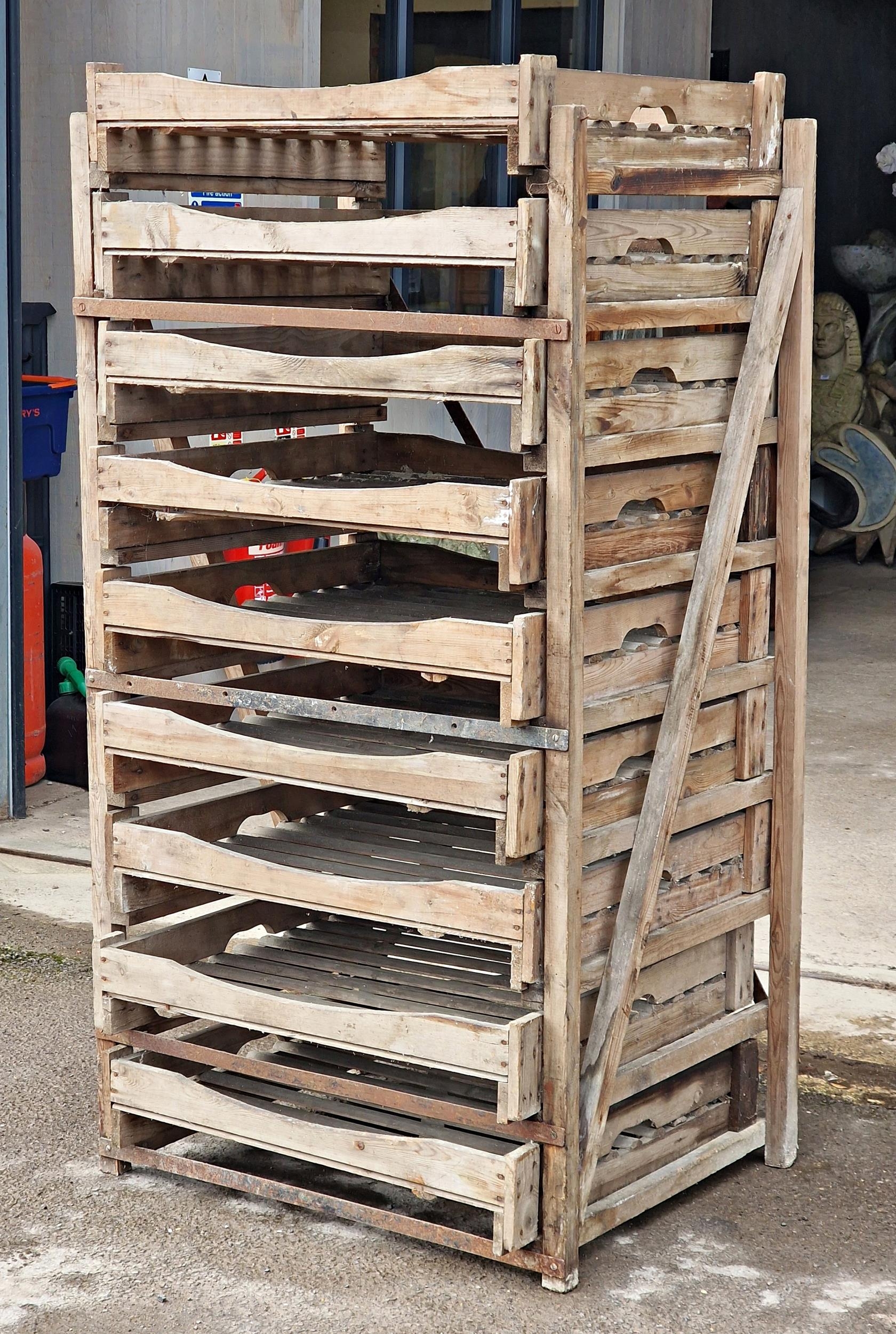 A vintage wooden apple store with nine pull out drawers, H 158cm x W 80cm x D 65cm