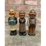 Quantity of hand carved German fruitwood shoe brushes in the form of Bavarian peasants, H 22cm (3)