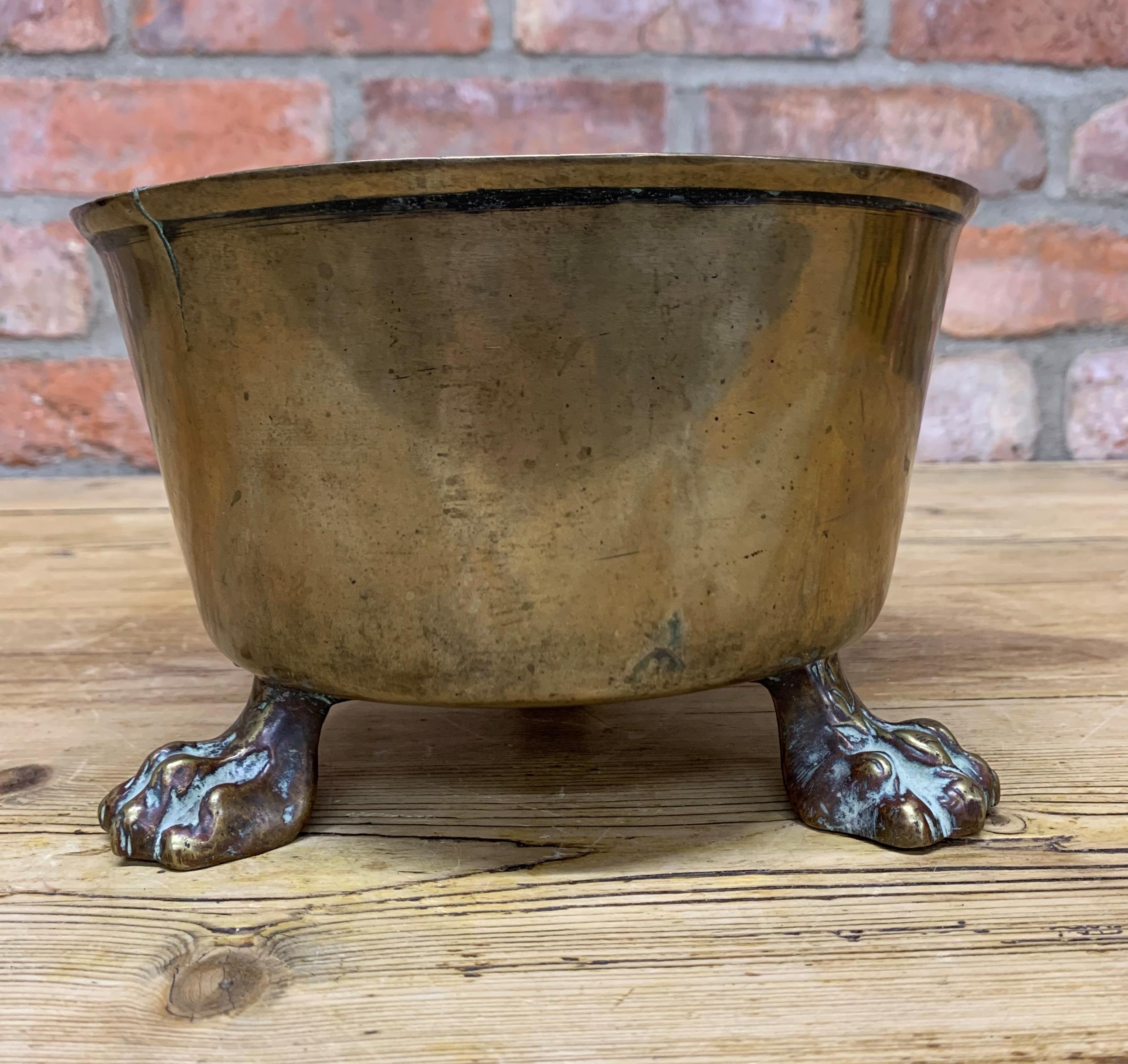 Antique brass bowl with three lion paw feet, H 13cm x D 20cm