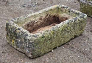 A weathered reconstituted stone trough, H 19cm x W 68cm x D 37cm