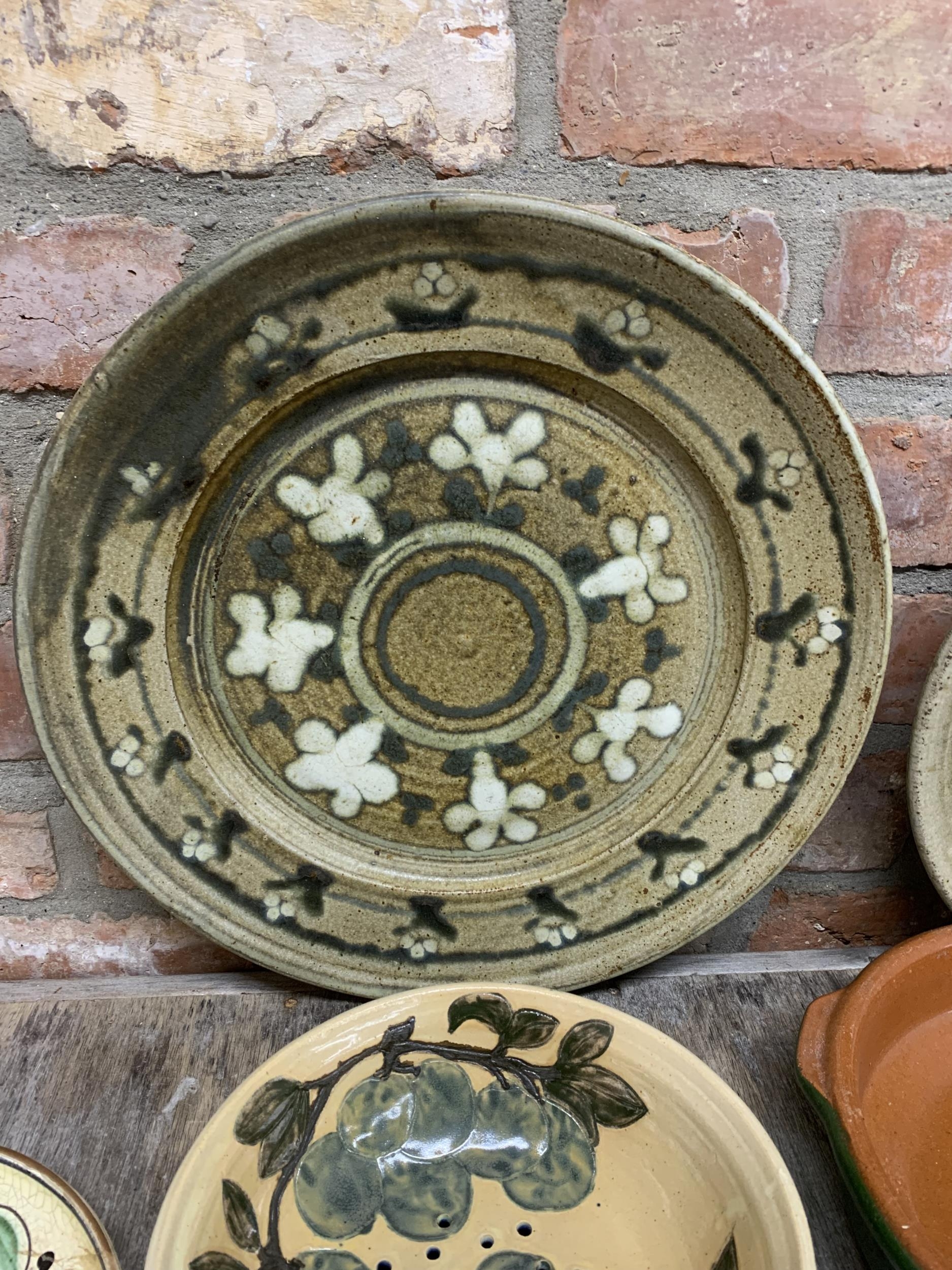 Assortment Of glazed slipware dishes to include impressive charger example, Largest D 40cm (7) - Image 2 of 5