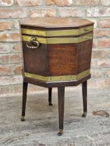 Regency and flame mahogany octagonal cellarette with twin handled finish, hinged lid revealing