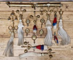 Quantity of antique horse parade harness decorations and brasses, to include swingers, fly head